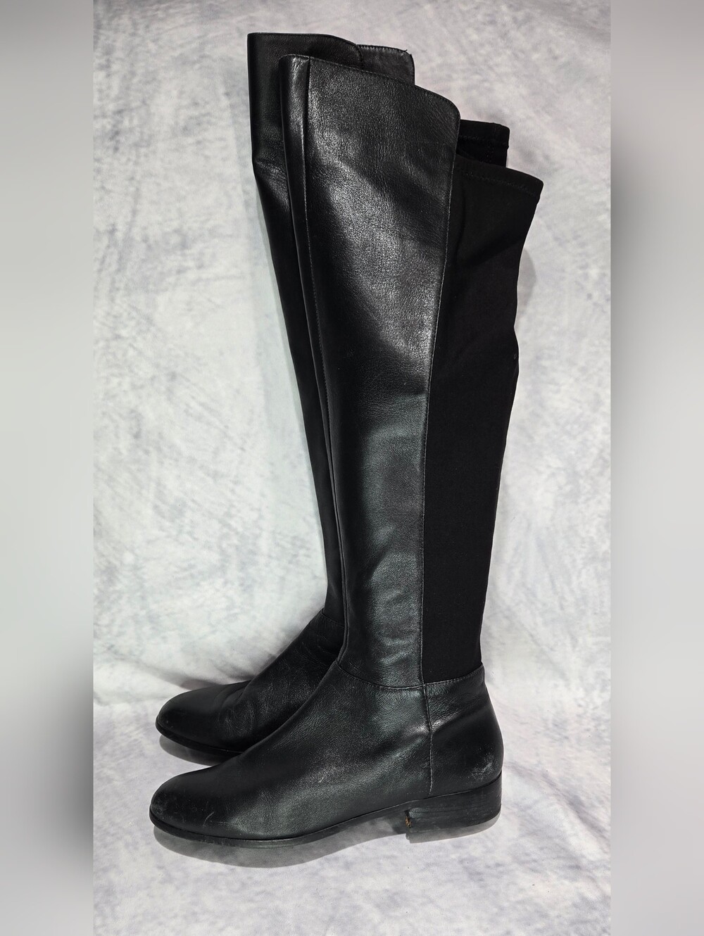 Michael Kors Bromley leather over-the-knee boots, featured in black with a polis